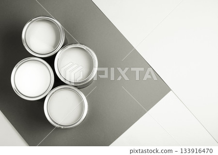 Four paint cans creating monochrome renovation concept. Color of 2026 year dancer in the white cloud Four paint cans creating monochrome renovation concept. Color of 2026 year dancer in the white cloud 133916470