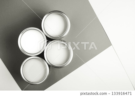 White paint cans on a gray and white background. Color of 2026 year dancer in the white cloud 133916471