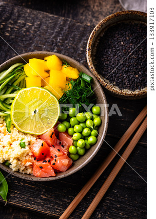 Healthy bowl with salmon and vegetables 133917103
