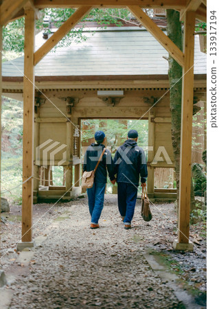 A scene of a couple in their 60s visiting a shrine A scene of a couple in their 60s visiting a shrine 133917194