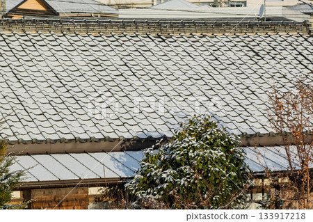 Snow-covered roof of a house 133917218