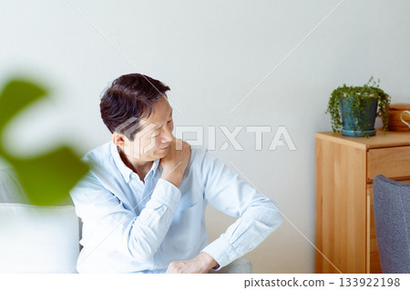 Senior man suffering from stiff neck Senior man suffering from stiff neck 133922198