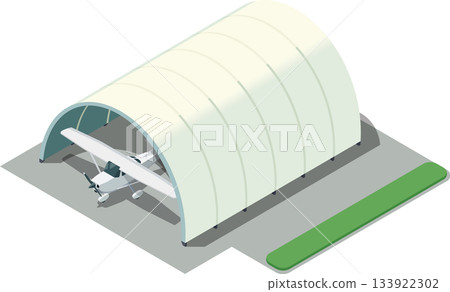 Light airplane parked in hangar 133922302