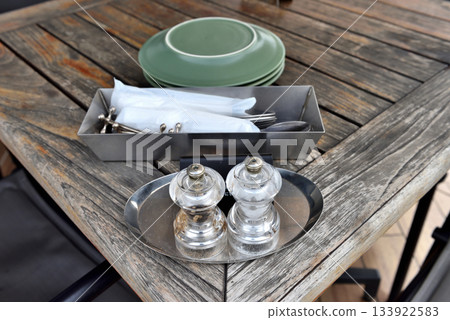 Table set on a restaurant table Table set on a restaurant table 133922583