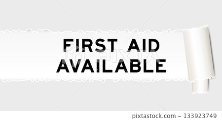 Ripped gray paper background that have word first aid available under torn part 133923749