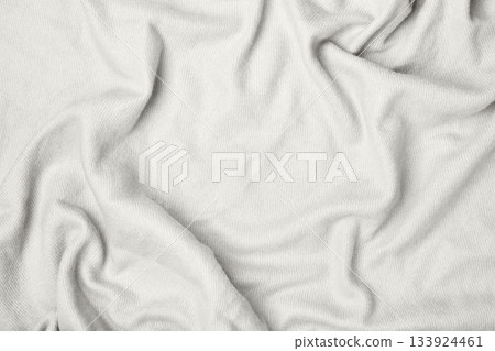 Crumpled white fabric creating an abstract texture background. Color of the Year concept Crumpled white fabric creating an abstract texture background. Color of the Year concept 133924461