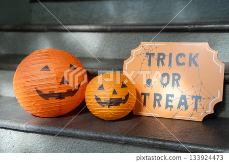 Halloween decorations and jack-o'-lantern ornaments/Trick or Treat signs and orange lanterns Halloween decorations and jack-o'-lantern ornaments/Trick or Treat signs and orange lanterns 133924473