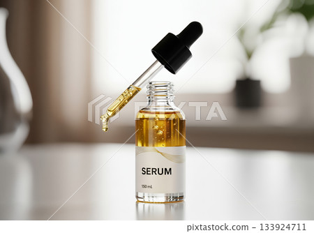 bottles of essential oil with fresh leaves bottles of essential oil with fresh leaves 133924711