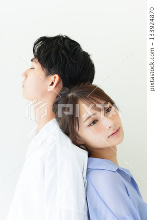 Back to back man and woman 133924870