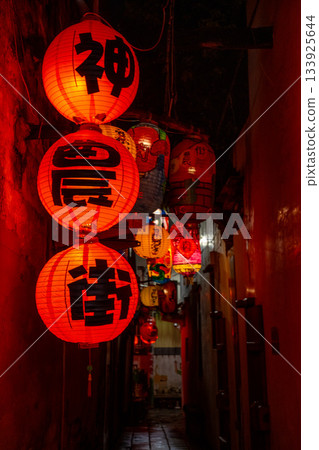 Tainan, Taiwan June 29, 2025: Shennong Street Alley. A night scene in Taiwan's most famous historic street. Tainan, Taiwan June 29, 2025: Shennong Street Alley. A night scene in Taiwan's most famous historic street. 133925644