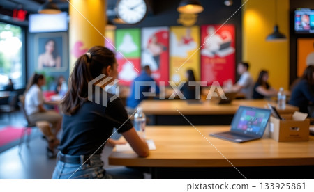 An interior view of a restaurant or c, where several people are seated around tables, engaged in conversations and meals An interior view of a restaurant or c, where several people are seated around tables, engaged in conversations and meals 133925861