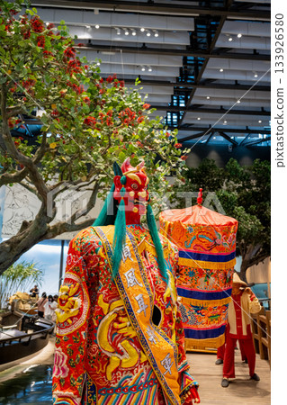 Tainan, Taiwan, June 29, 2025: Inside the Taiwan National Museum of History, colorful and embroidered exquisite traditional Taiwanese Temple Touring God Statue Tainan, Taiwan, June 29, 2025: Inside the Taiwan National Museum of History, colorful and embroidered exquisite traditional Taiwanese Temple Touring God Statue 133926580