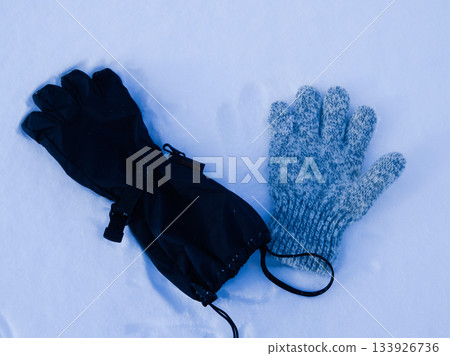 Contrasting materials: two types of gloves to protect you from the cold 133926736