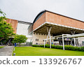 Tainan, Taiwan – June 29, 2025: Exterior view of the National Museum of Taiwan History, showcasing its unique modern architectural style and red brick exterior. 133926767