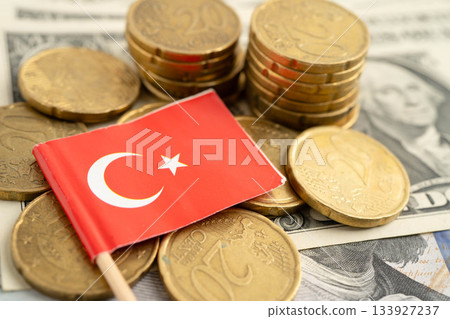 Turkey flag on coin and banknote money, finance trading investment business currency. Turkey flag on coin and banknote money, finance trading investment business currency. 133927237