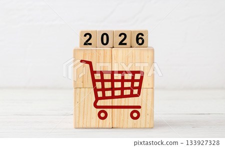 Red Shopping Cart Icon on Wooden Blocks with 2026 Year Display Red Shopping Cart Icon on Wooden Blocks with 2026 Year Display 133927328