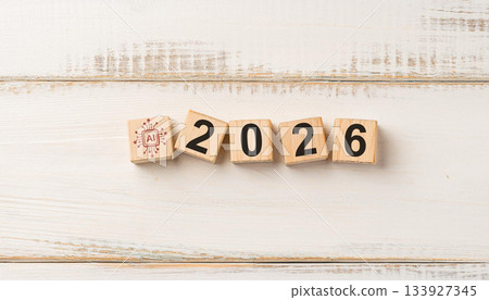 AI Technology Icon and Wooden Blocks Forming 2026 on Light Wooden Background Representing Artificial Intelligence Future 133927345