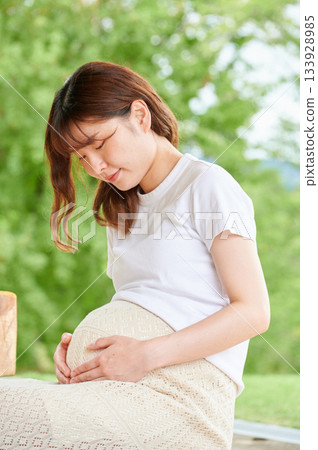 Pregnant woman park nature Pregnant woman park nature 133928985