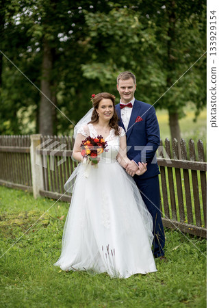 Joyful Outdoor Wedding Portrait Joyful Outdoor Wedding Portrait 133929154