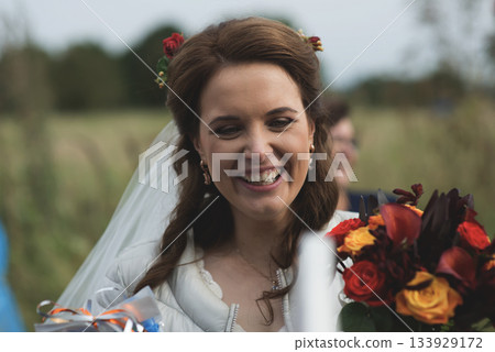 Bride Smiling with Bouquet Bride Smiling with Bouquet 133929172