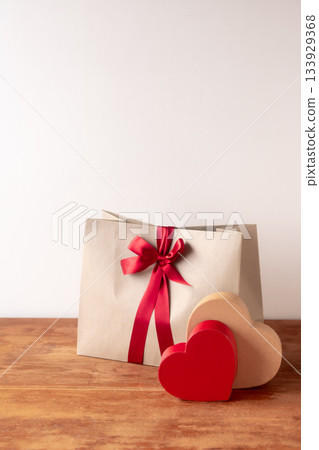 A sweets box and a cute shopper tied with a ribbon A sweets box and a cute shopper tied with a ribbon 133929368