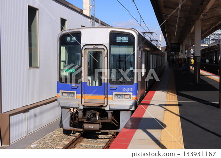 Nankai Electric Railway 1000 series train on the Takashihama Line Nankai Electric Railway 1000 series train on the Takashihama Line 133931167