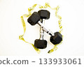 Dumbbells positioned on a clean white surface, surrounded by a measuring tape, representing fitness goals, health awareness, and the importance of physical activity for well-being 133933061