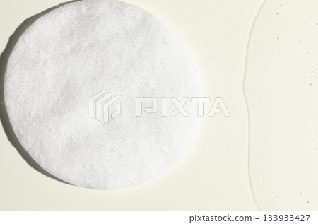 A cotton pad for removing makeup and micellar water. A cotton pad for removing makeup and micellar water. 133933427
