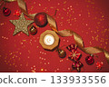 Christmas background with red and gold decorations on red paper, holiday card 133933556