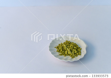 Matcha Powder and Drink on White Background Matcha Powder and Drink on White Background 133933573
