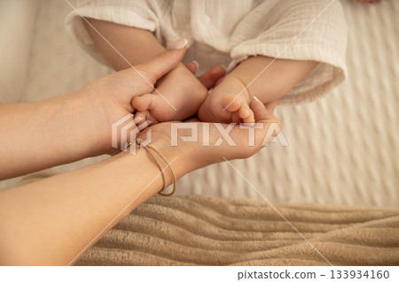 Warm moment shared between a mother and her baby at home 133934160