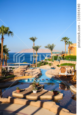 A resort landscape of an Egyptian hotel overlooking Tiran Island A resort landscape of an Egyptian hotel overlooking Tiran Island 133934340