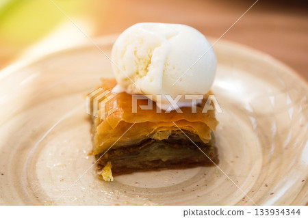 A delicious dessert - Turkish baklava with ice cream A delicious dessert - Turkish baklava with ice cream 133934344