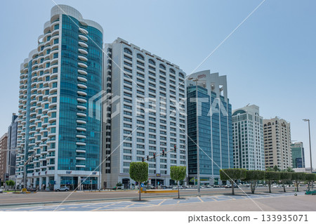 New modern Apartments in residential complex, Abu Dhabi urban skyline and modern buildings New modern Apartments in residential complex, Abu Dhabi urban skyline and modern buildings 133935071
