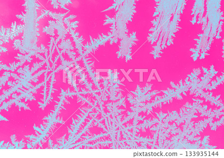 Photo of the frozen window. Natural ice texture on the glass. Abstract nature background Photo of the frozen window. Natural ice texture on the glass. Abstract nature background 133935144