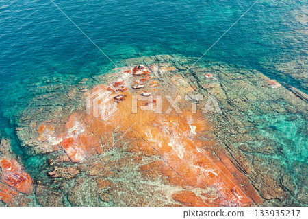 Seascape background. Drone view. Rocky seashore. Nature rocky background Seascape background. Drone view. Rocky seashore. Nature rocky background 133935217
