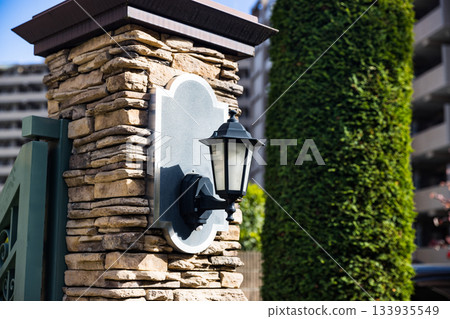 Outdoor lights on gateposts 133935549