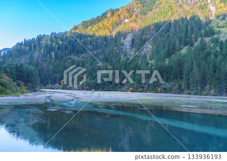 Scenery Jiuzhaigou national park in Sichuan, China. Beautiful of Arrow Bamboo Lake and snow mountain in Autumn season. Famous Landmark and Vacation near Chengdu, China. Asia travel concept 133936193