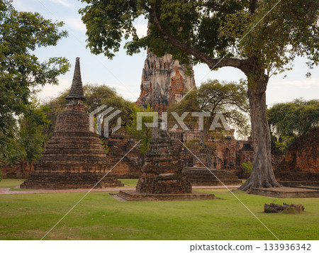 Wat Phra Ram Ayutthaya's ancient temple and iconic landmarks, showcasing intricate architecture, historical ruins, and cultural heritage in serene atmosphere of this UNESCO World Heritage site. 133936342