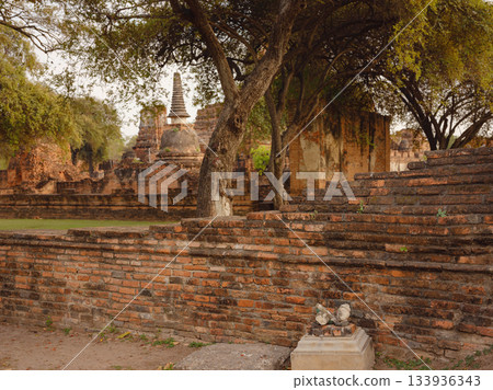 Wat Phra Ram Ayutthaya's ancient temple and iconic landmarks, showcasing intricate architecture, historical ruins, and cultural heritage in serene atmosphere of this UNESCO World Heritage site. Wat Phra Ram Ayutthaya's ancient temple and iconic landmarks, showcasing intricate architecture, historical ruins, and cultural heritage in serene atmosphere of this UNESCO World Heritage site. 133936343
