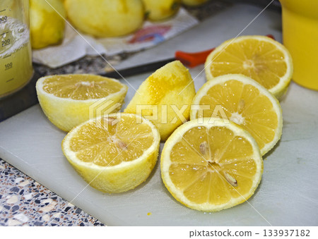 Halved, peeled lemons Halved, peeled lemons 133937182