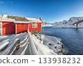 Winter view on Hamnoy village and bridge to Olenilsoya island. 133938232