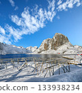 Fantastic winter view on Hamnoy village and  lots of empty drying racks. 133938234
