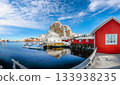 Winter view on Hamnoy village with port and Festhaeltinden mountain on background. 133938235