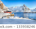 Winter view on Hamnoy village with port and  Olstinden peak on background. 133938246