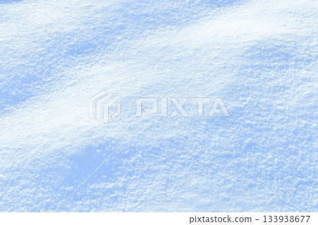 Fresh sparkling snow delicate blue close-up, perfect as a winter season background texture 133938677