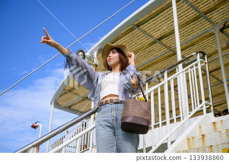 Pointing woman on board Pointing woman on board 133938860