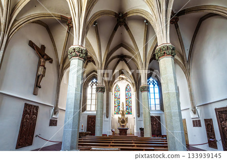 Passau, Germany - Apr 16, 2025: St. Stephans cathedral in Passau, Germany is an old white church with green metal domes 133939145