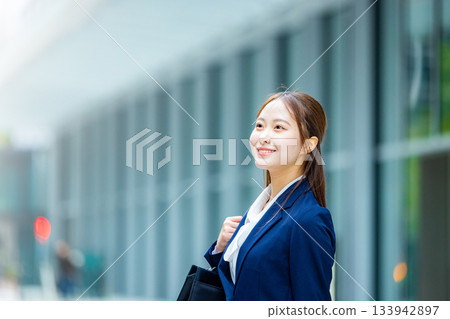 A woman working hard at job hunting A woman working hard at job hunting 133942897