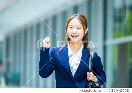 A woman working hard at job hunting 133942908